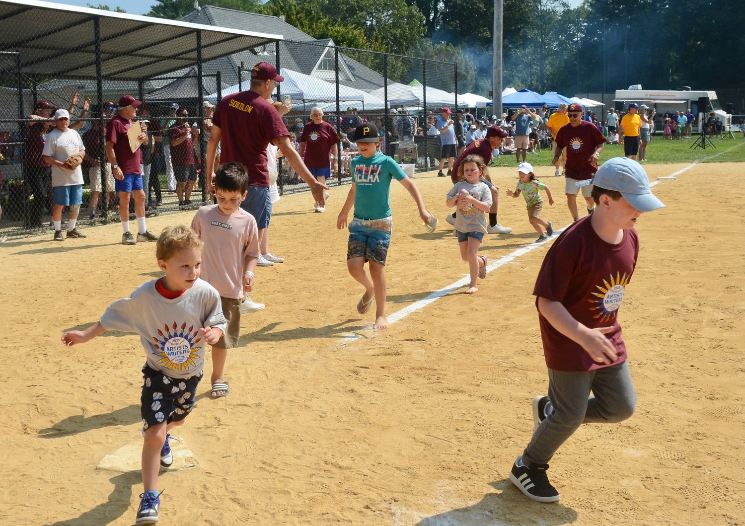 The kids round the bases.  KYRIL BROMLEY
