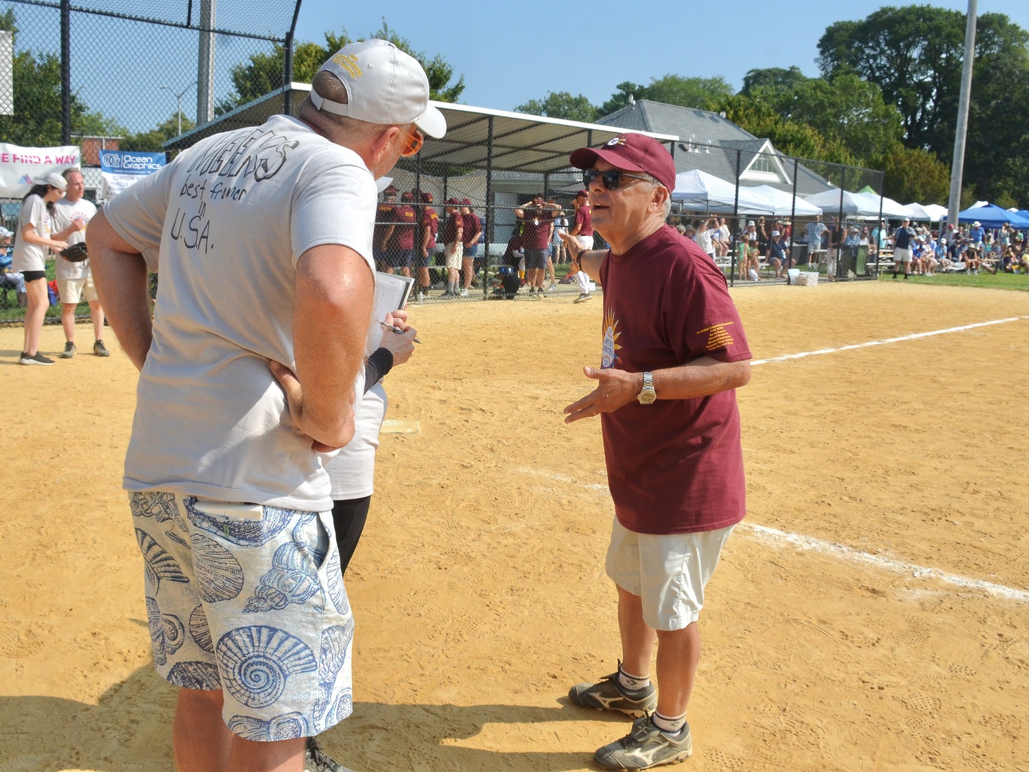 It wouldn't be a legitimate Artists and Writers Charity Softball Game without Mike Lupica arguing a call.  KYRIL BROMLEY