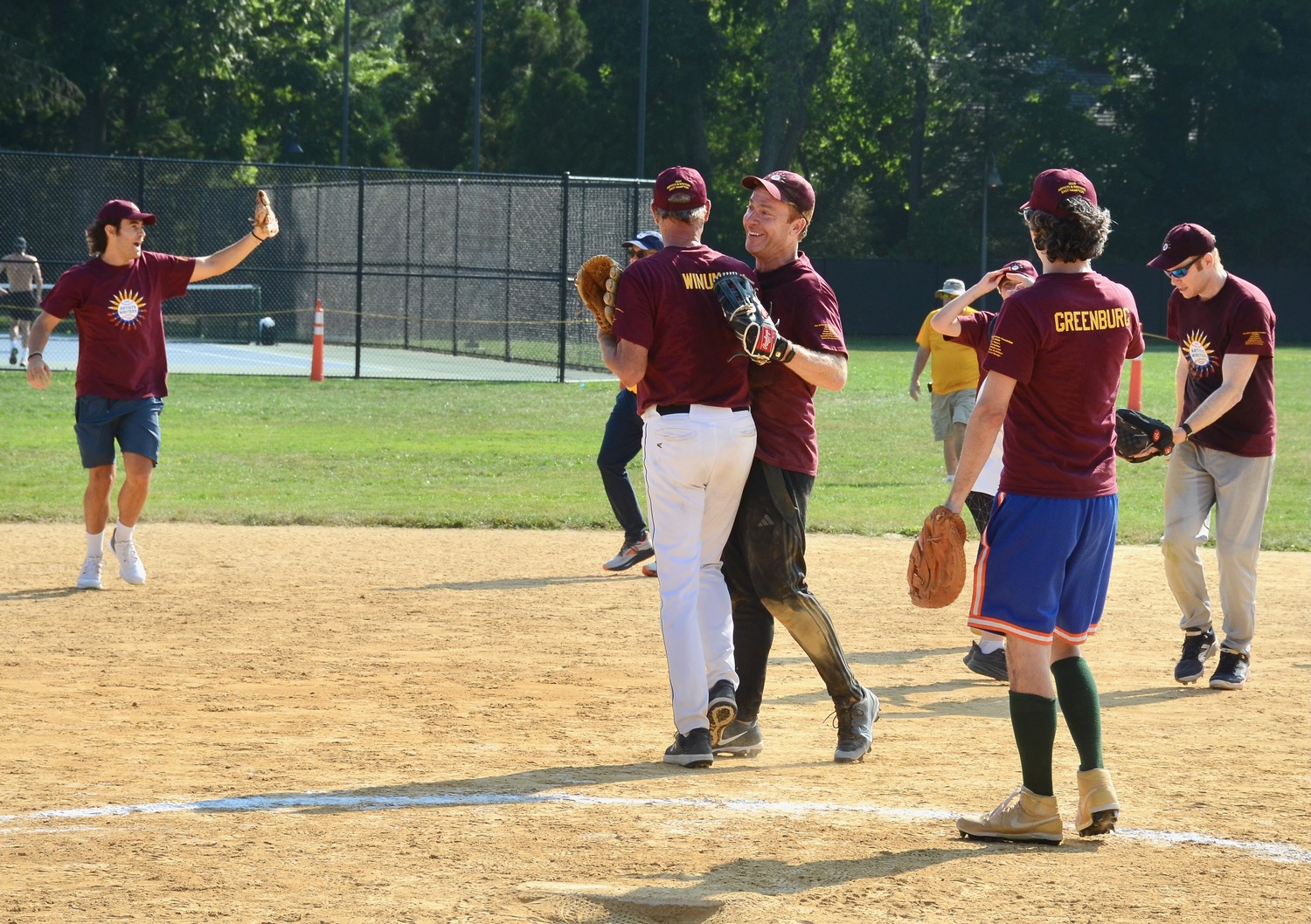 The Writers celebrate their 9-6 victory on Saturday afternoon.  KYRIL BROMLEY