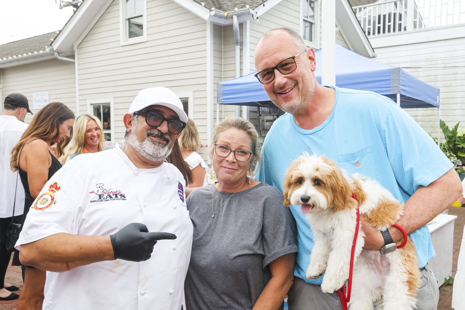 Marco Barilla, Tami Brandt, Seth Stern, Moose the dog at the Citizens 4 Humanity fundraiser on August 13 in Southampton.
Rob Rich/SocietyAllure.com