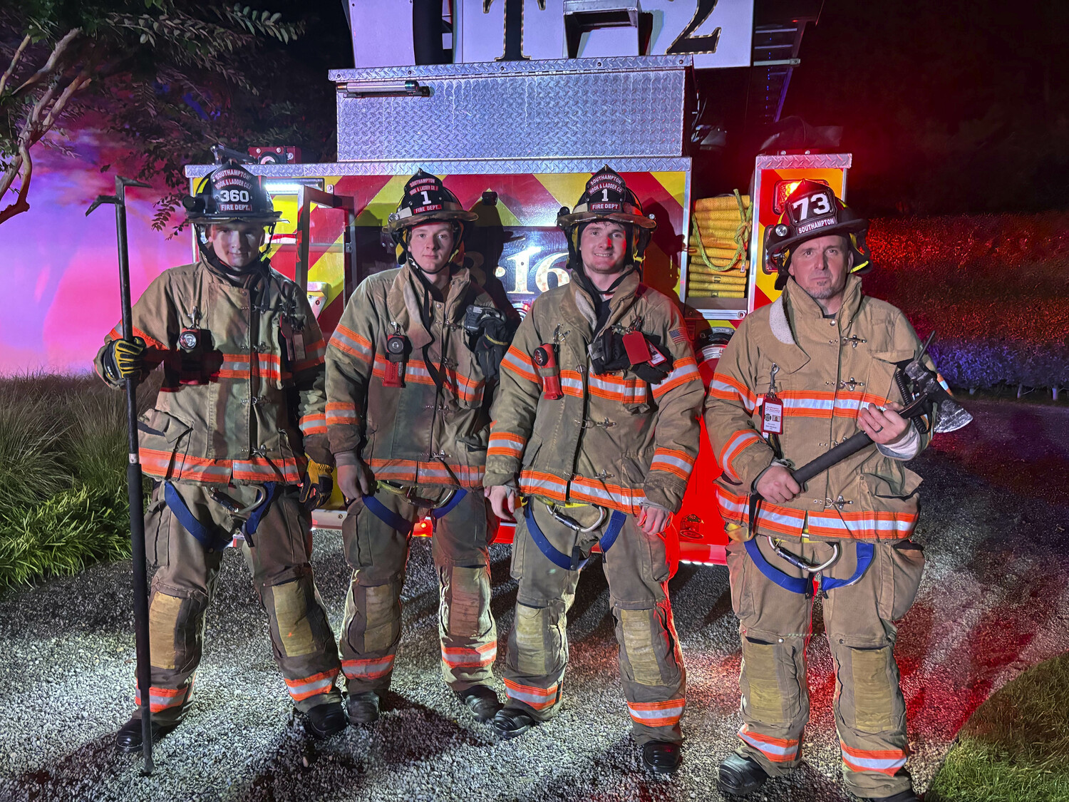 The Maddock family firefighters: Mark Maddock, far right, and his three sons, left to right, Jagger, Zayne and Nicholas all responded to an eight-alarm fire in Southampton Village in July.  COURTESY SOUTHAMPTON FIRE DEPARTMENT