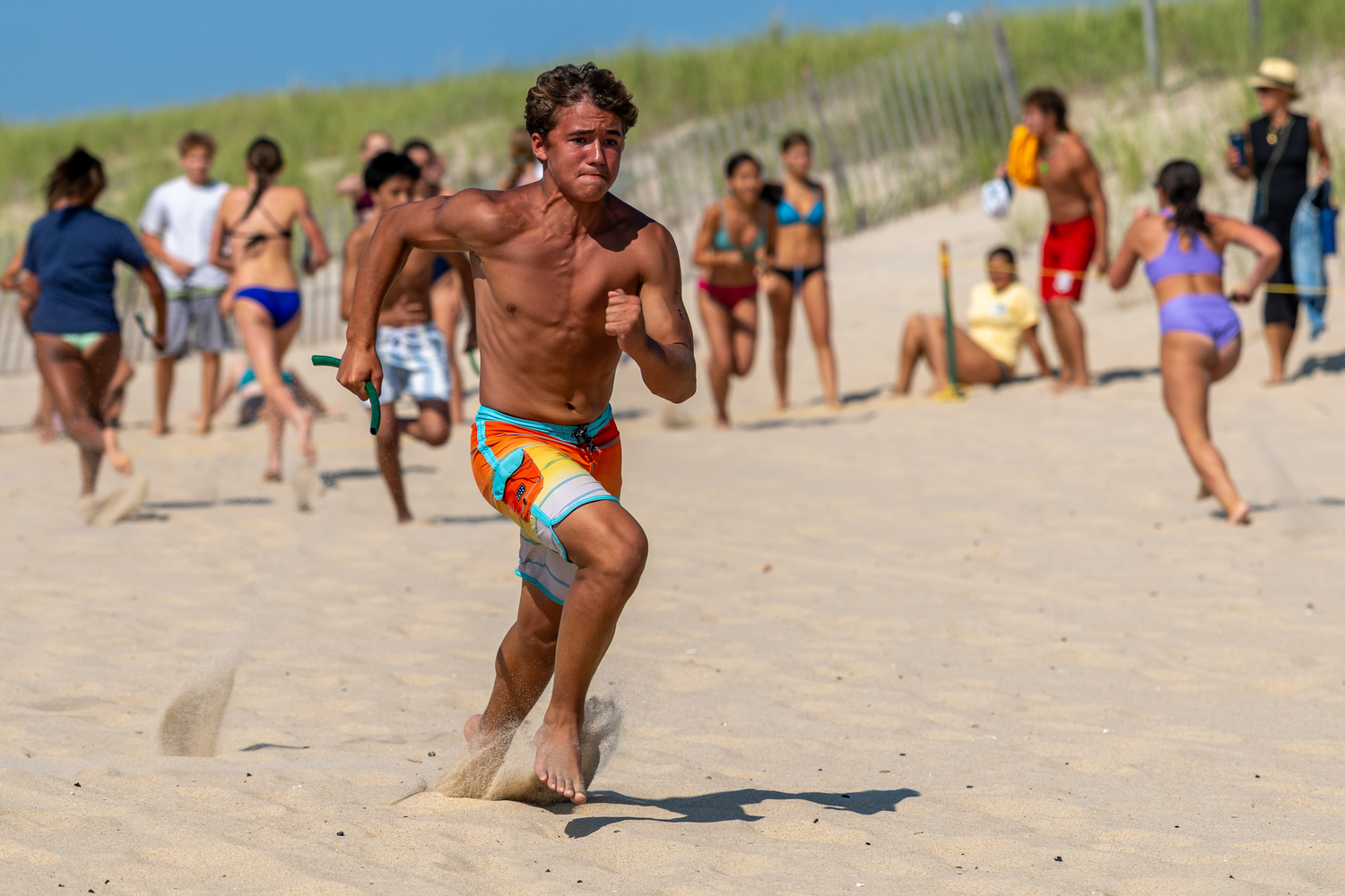 A junior lifeguard competing in the sand relay.  RON ESPOSITO