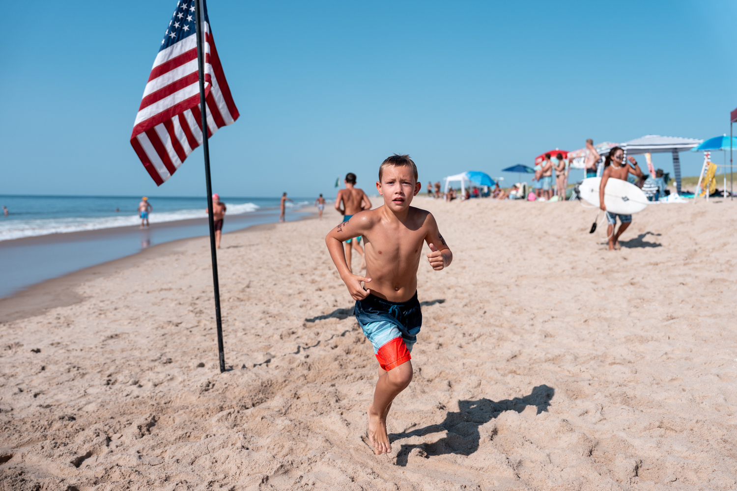 A junior lifeguard competing in the distance run. RON ESPOSITO