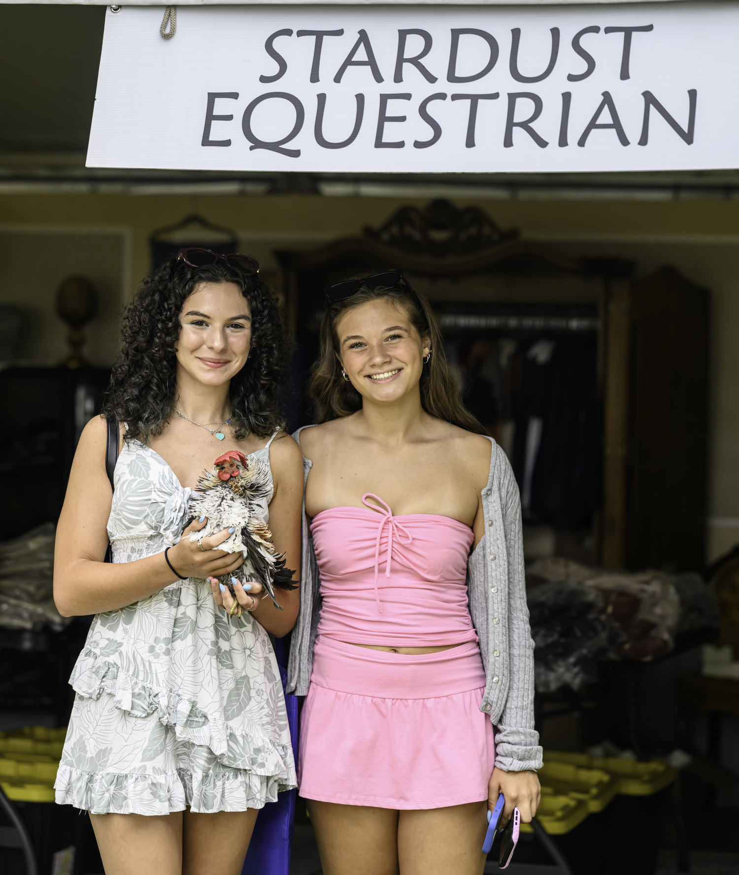 At Stardust Equestrian booth with Foobie the chicken and shoppers.  MARIANNE BARNETT