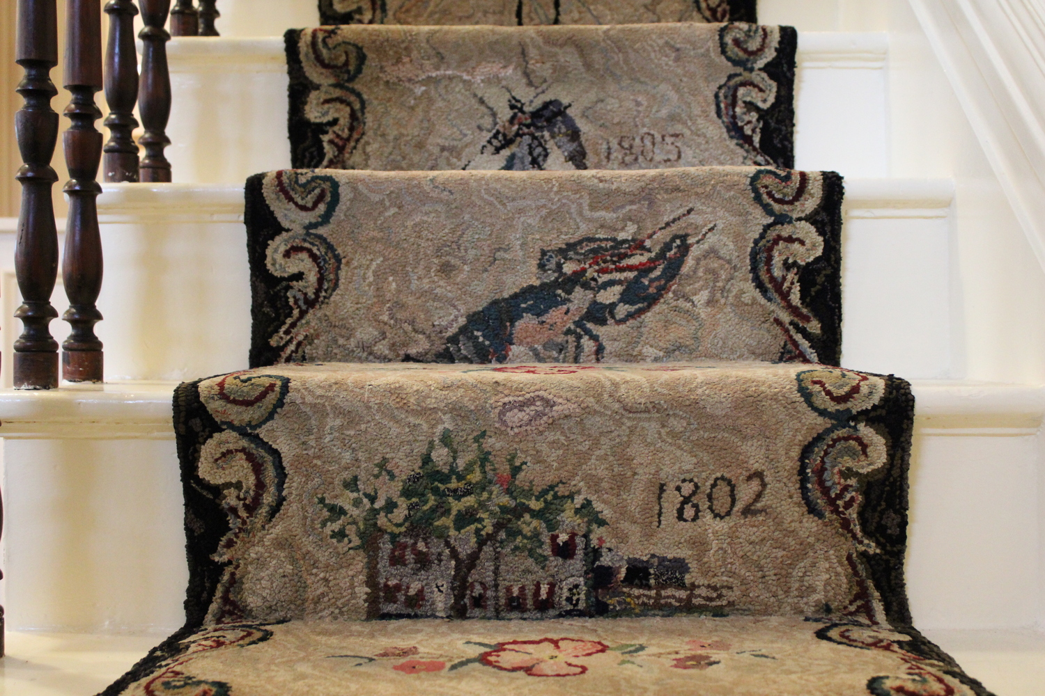 Walking up the stairs at Village Hall is now a history lesson, Village Historian Hugh King said. JACK MOTZ