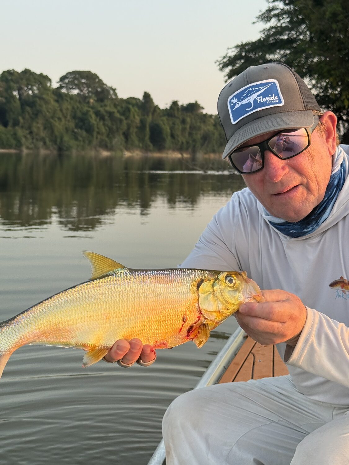 Colin Ambrose with a peacock bass caught on the Amazon.