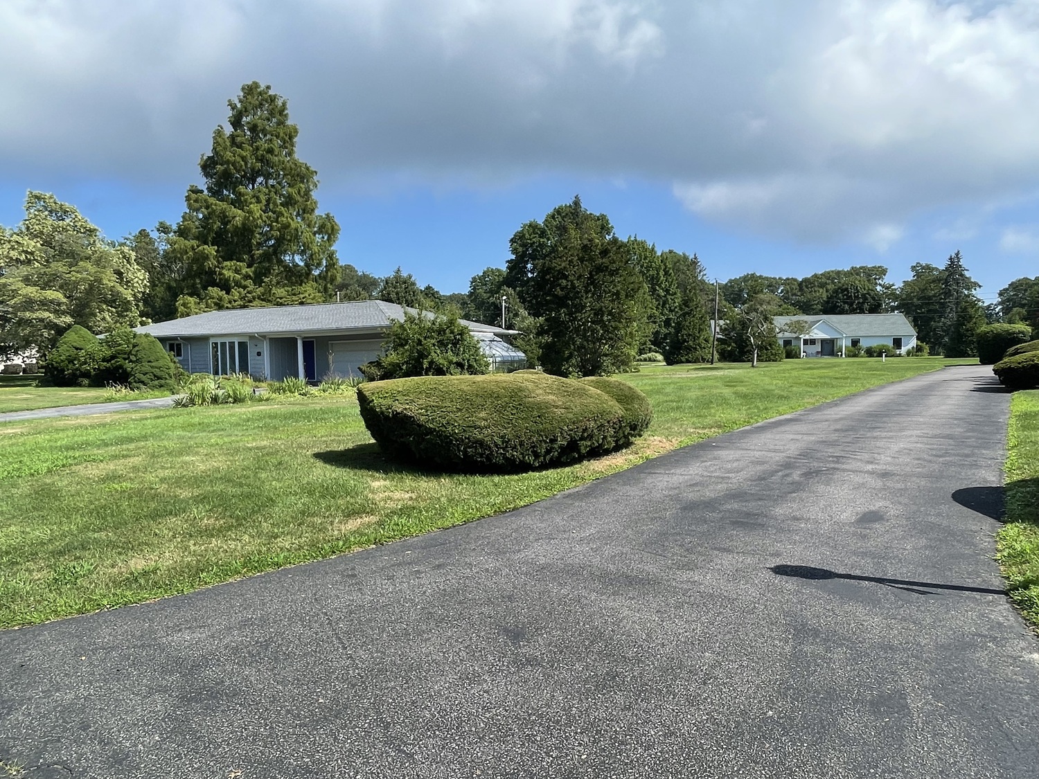 Original intact ranch houses in the same neighborhood as the renovated ones. ANNE SURCHIN
