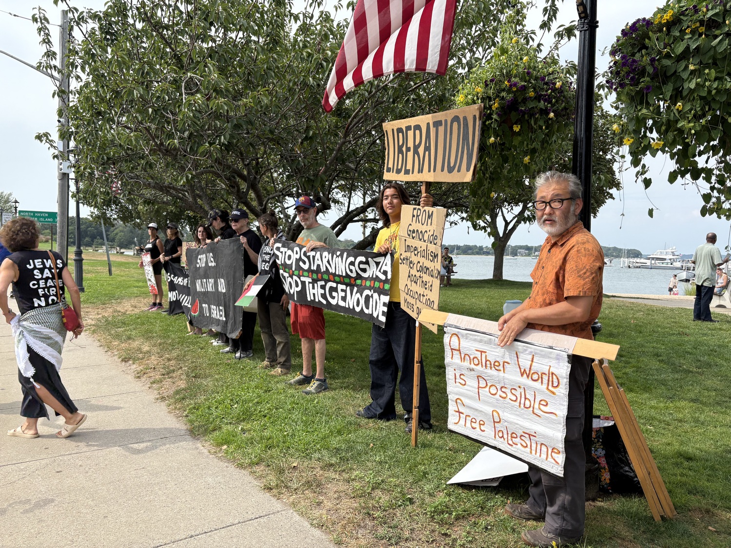 Members of the group East End for Peace and Justice have been holding a weekly vigil in Sag Harbor since October of 2023, calling for an end to the war in Gaza and an end to the U.S. support of Israel in the war.  CAILIN RILEY PHOTOS