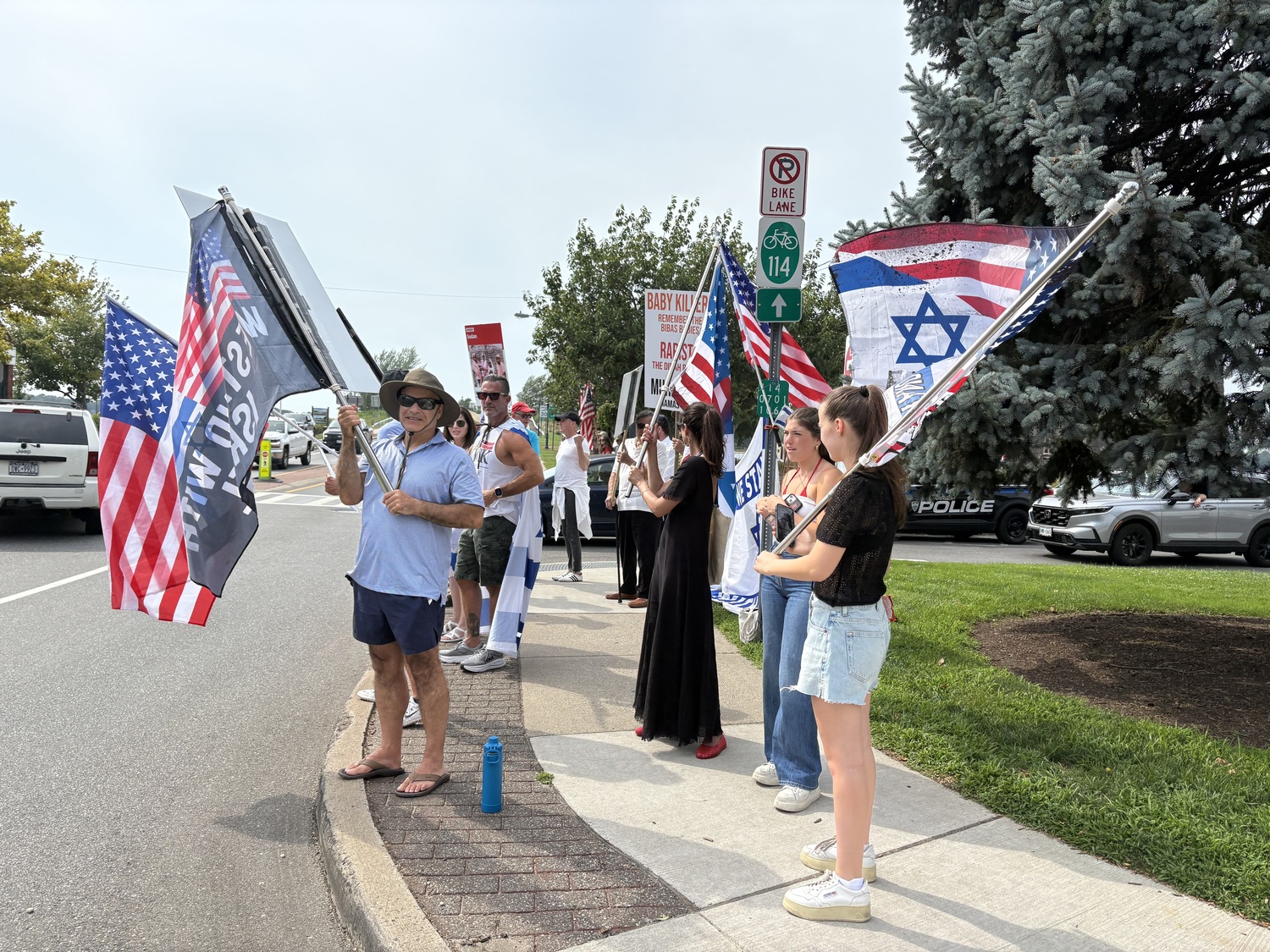 Members of the Stand With Israel group have been gathering in Sag Harbor at the same time that the group, East End for Peace and Justice, holds its weekly vigil, demanding an end to the war in Gaza and an end to U.S. support of Israel in the war. CAILIN RILEY PHOTOS