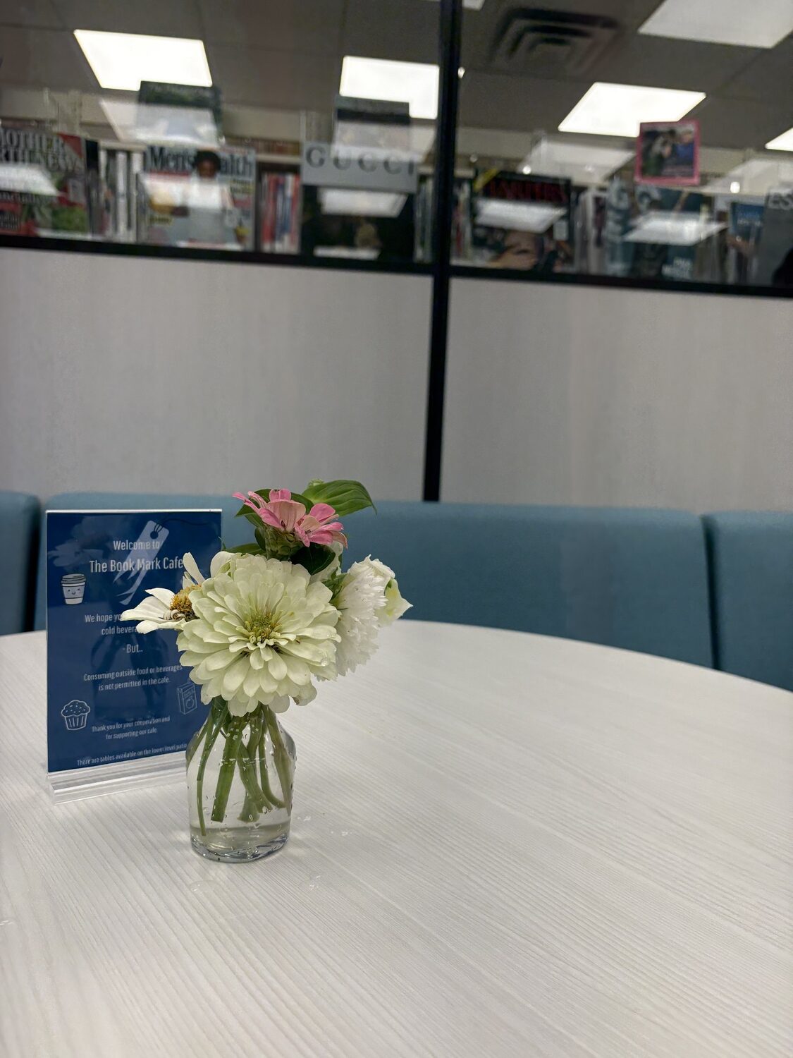 Fresh flowers, picked from the garden of Friends of the Library board member Jayne Clare, adorn the tables in the Bookmark Cafe. CAILIN RILEY