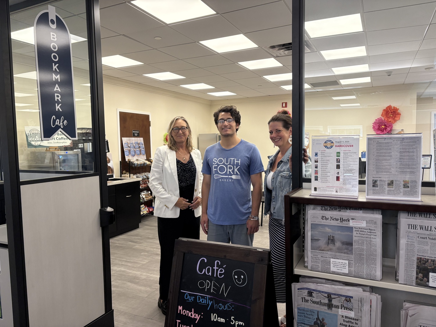 The Bookmark Cafe at Rogers Memorial Library in Southampton is hosted and staffed by South Fork Bakery, a nonprofit bakery that provides paid employment and job training for adults with disabilities. From left, South Fork Bakery Executive Director Bridget Fleming, Bookmark Cafe employee Robbie Hernandez, and South Fork Bakery Director of Operations and Lead Baker, Jessica Taccone. CAILIN RILEY