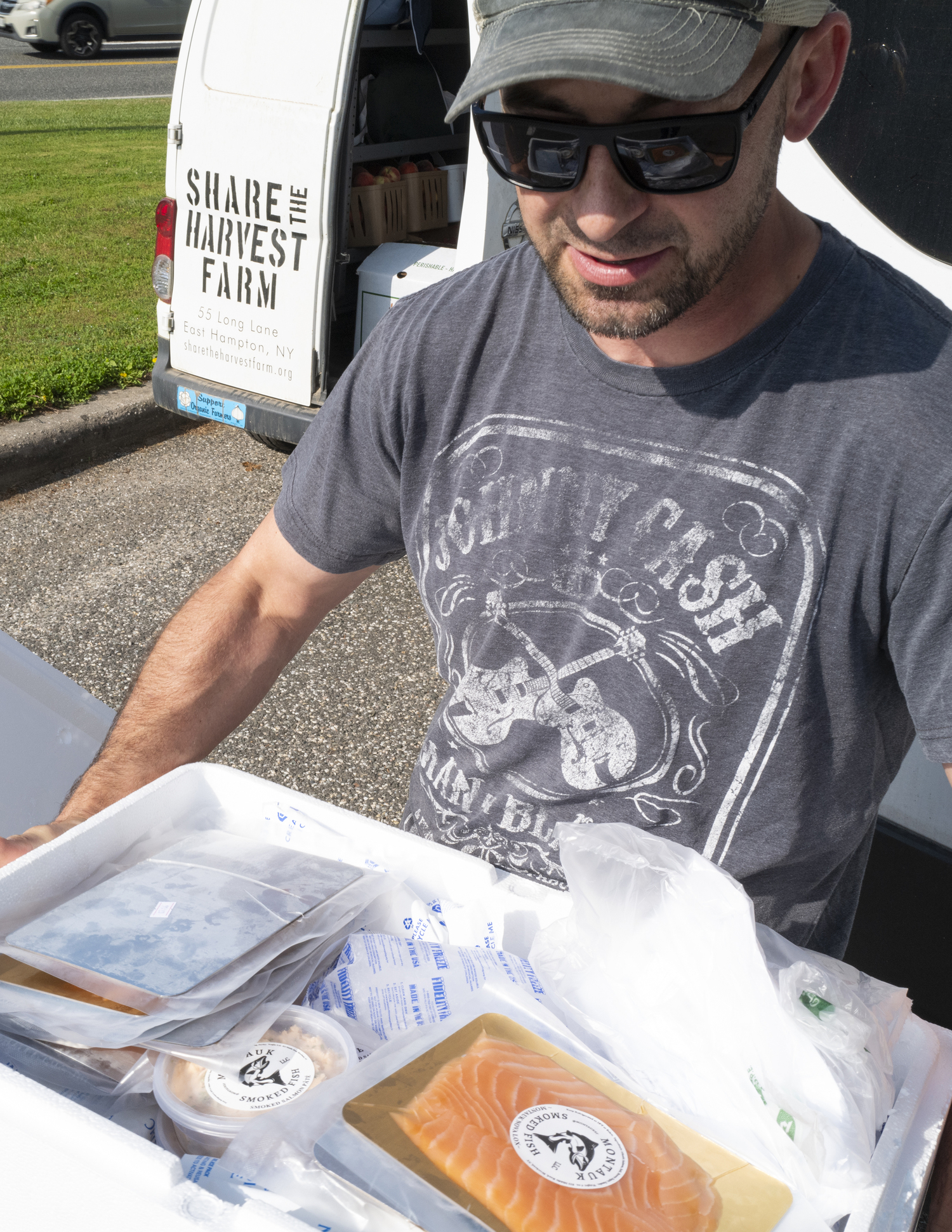 Carl Nickerson from Montauk Smoked Fish with nova lox, smoked salmon dip and whitefish pâté. Share the Harvest Farm stand curates a selection of local produce, artisanal baked goods, dairy products and grass-fed meats. LORI HAWKINS