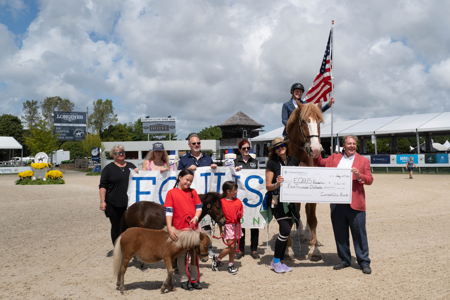 Seamus Doyle presented a donation from Connect One Bank to the EQUUS Foundation.  LORI HAWKINS