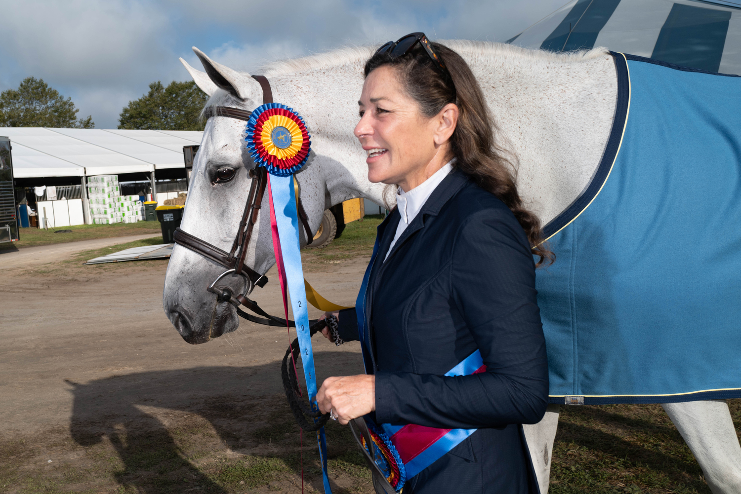 Anne Byers of Locust Valley with her mount Rocklyn after the pair won the Adult Amateur Owner Division and also overall grand champion of Locals Day.  LORI HAWKINS