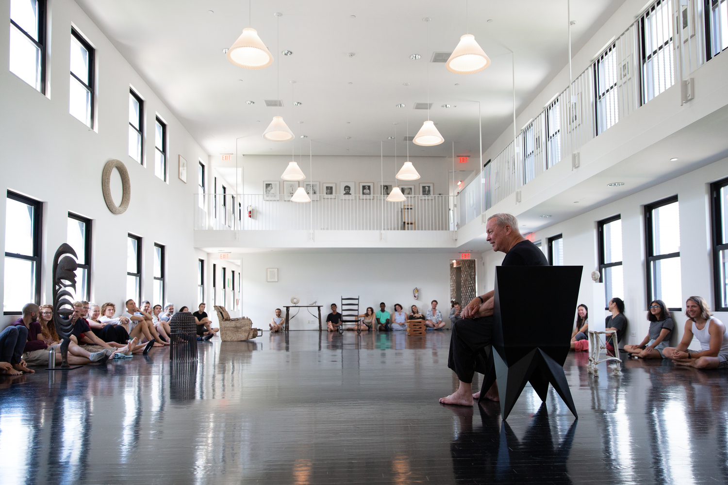 Robert Wilson leads a morning meeting in the Big Studio of The Watermill Center. CHLOE BELLEMERE