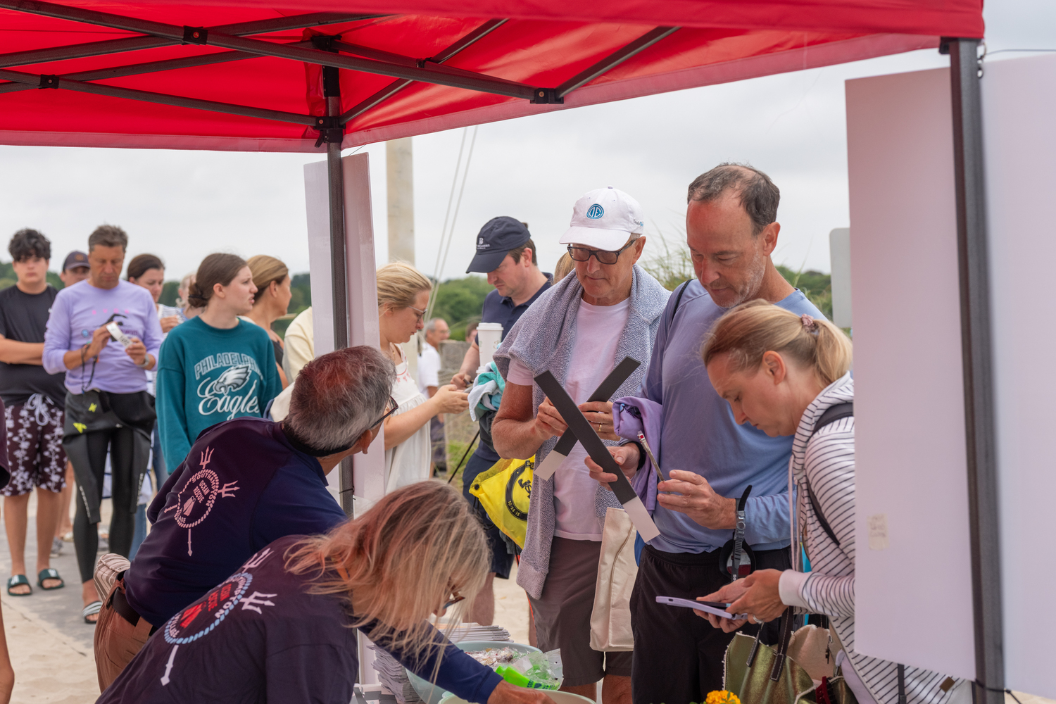 Southampton Village Ocean Rescue hosted its annual S-Mile Open Water Swim on Saturday morning at Coopers Beach.   RON ESPOSITO