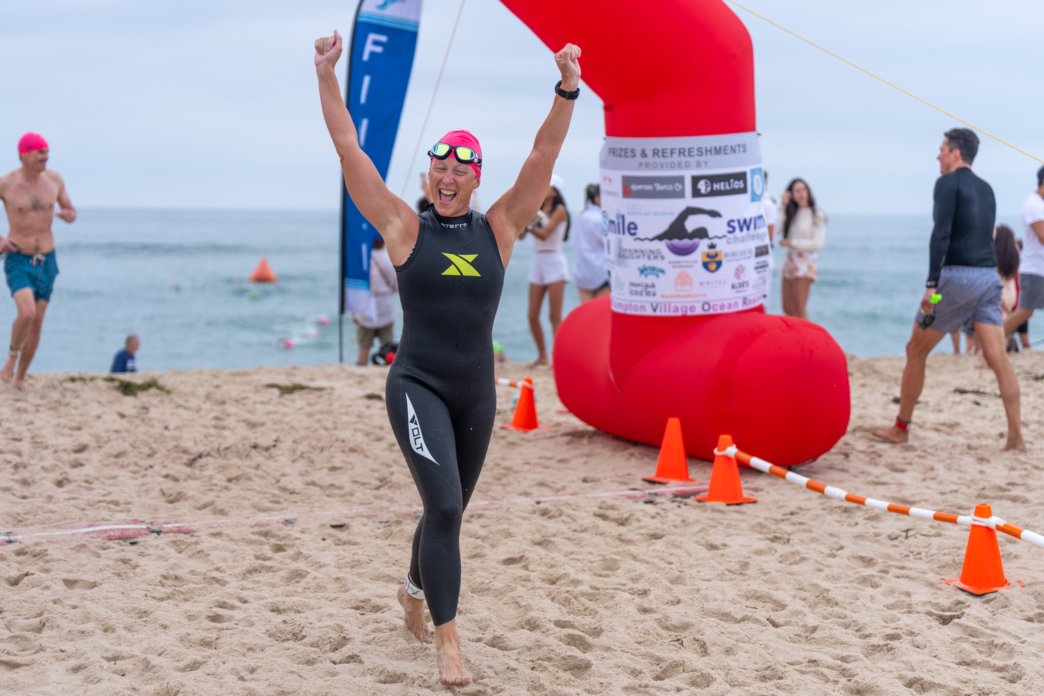 Southampton Village Ocean Rescue hosted its annual S-Mile Open Water Swim on Saturday morning at Coopers Beach.   RON ESPOSITO