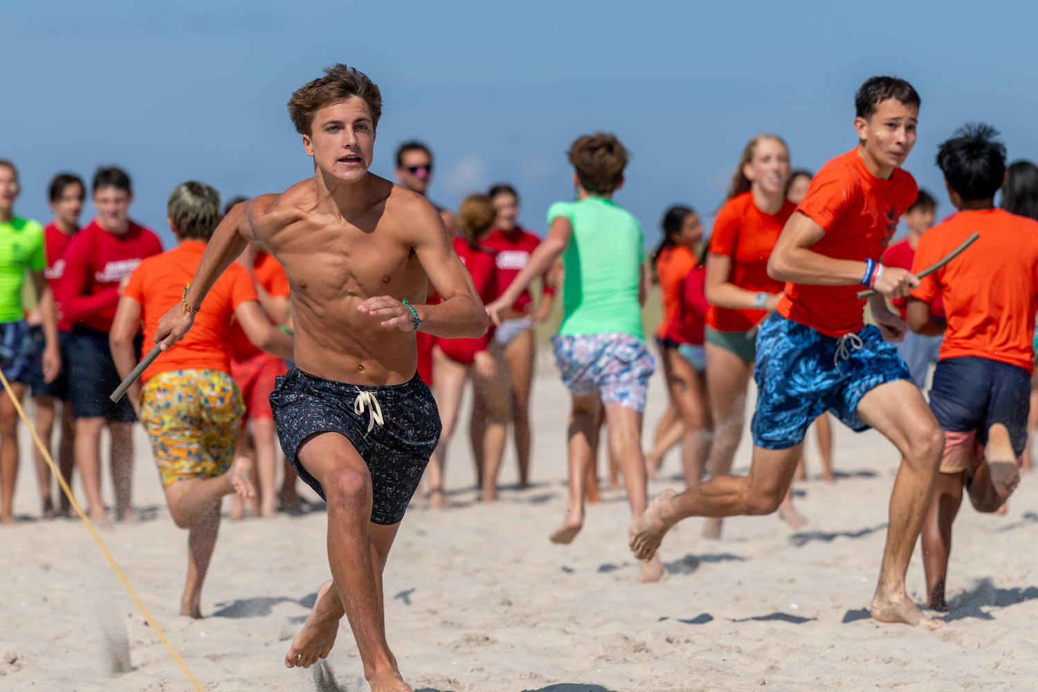 A junior lifeguard competes in the 4x100 sand relay.  RON ESPOSITO