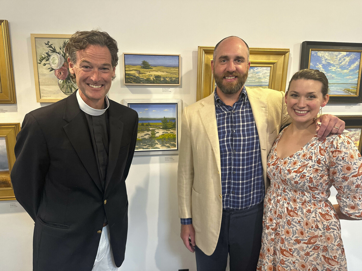 Jeremy Carlson with Brendan and Katie Johnston at the St. John's Art Fair.    GREGORY D'ELIA