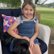 Scarlett Parry with her dog, Chester. COURTESY JOHN PARRY