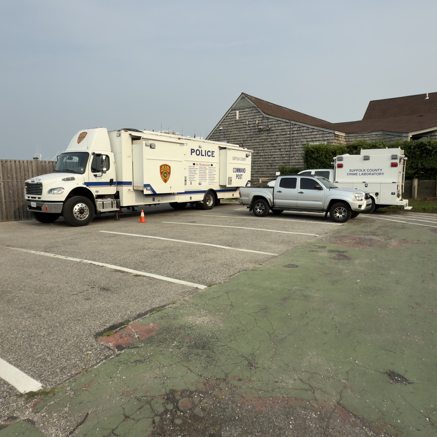 Suffolk County Police Department has a command post and laboratory set up at the scene. DOUG KUNTZ