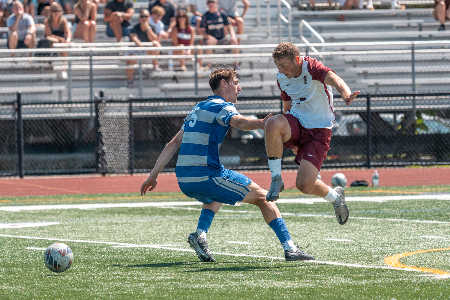 Fordham senior Andre Insalaco tries to get by Seton Hall senior Agustin Resch.  RON ESPOSITO