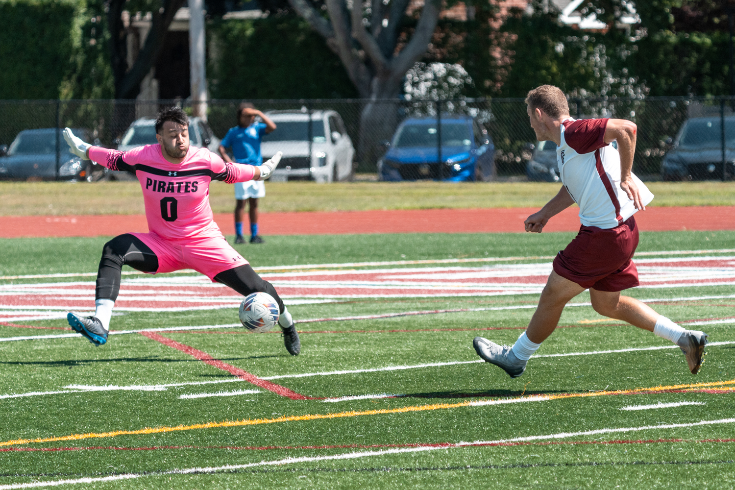 Fordham senior Andre Insalaco puts a shot on Seton Hall senior goalie Mick Sipples.  RON ESPOSITO