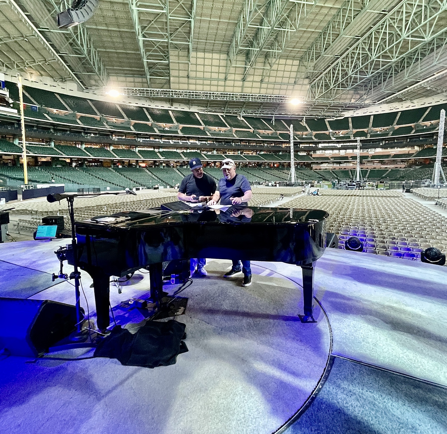 Steve Cohen and Billy Joel going over details before a 2022 concert in Houston. MYRNA SUAREZ