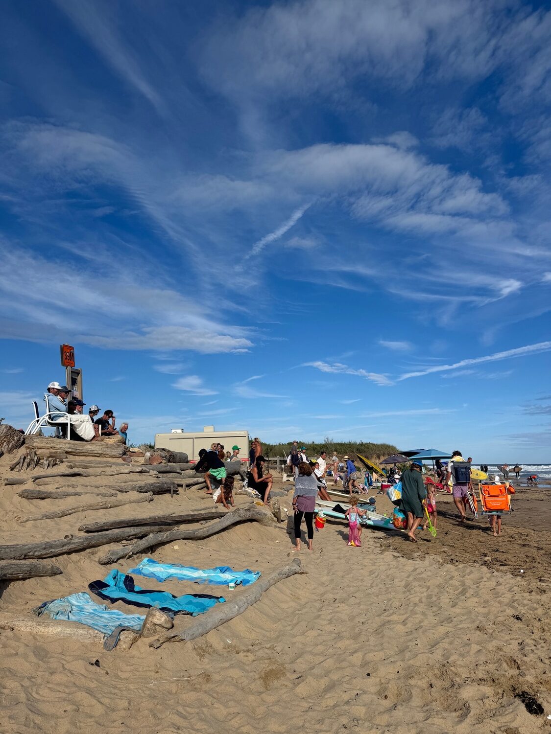 Surfers eagerly anticipating swells up to 15 feet from Hurricane Erin arriving on the South Fork beaches on Wednesday. EMMA WRIGHT