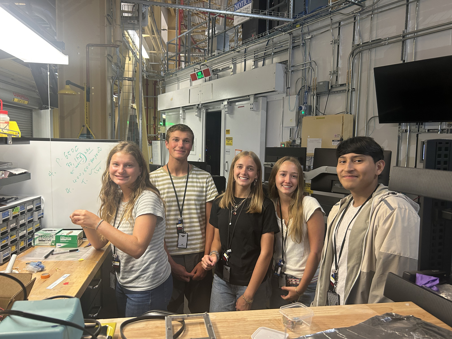 Beatrice Flight, Griffin Beckman, Sophie Lancashire, Chelsea Fromm and Wilmer Verdugo are all students in East Hampton High School's science research class and spent time this summer working at Brookhaven National Labratory. STEPHANIE FORSBERG