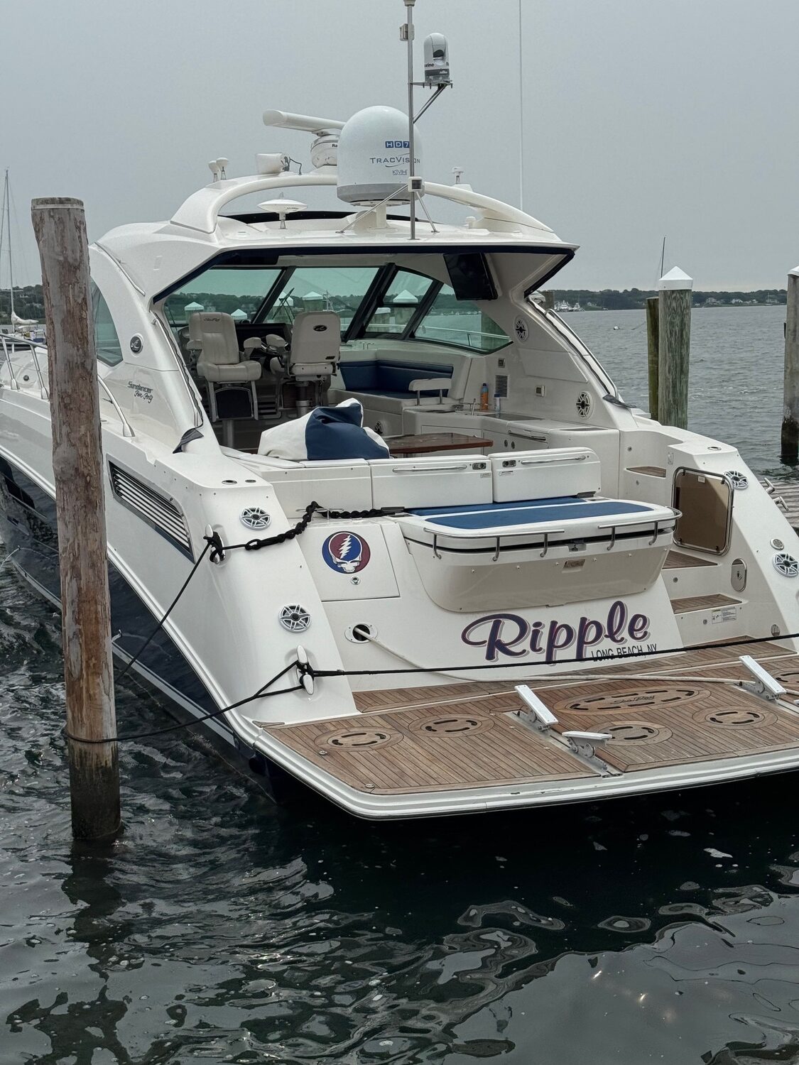 The woman was found dead aboard Ripple, a 54-foot cabin cruiser, which is berthed next to a large center console named Hell In a Bucket. Both boat names reference Grateful Dead songs and owned by the same person, other boat owners at the Montauk Yacht Club said. T.E. MCMORROW