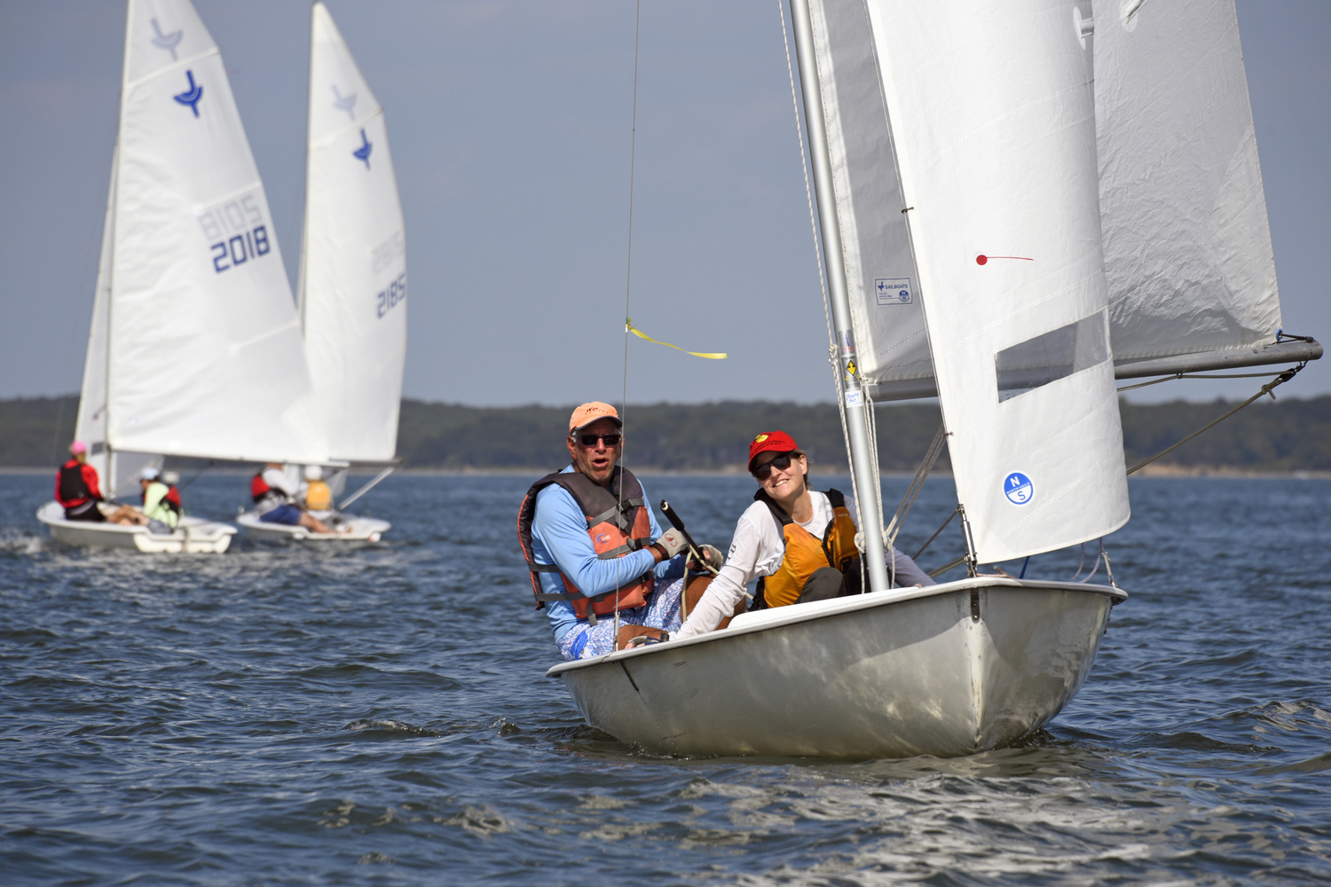 Former Breakwater commodore Lee Oldak, who races his 30-foot sloop Purple Haze throughout the season, and crew Sarah Alford catching the photographer’s attention!  MICHAEL MELLA
