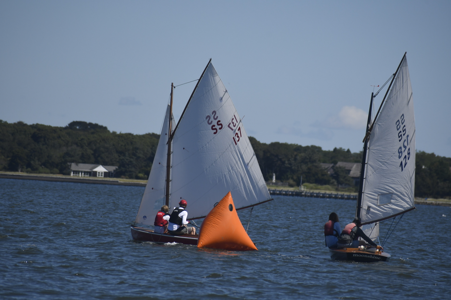Simon and Serena Gerson (137), Saturday's winner of the Dudley Trophy, and Mike Nelson and Jayden Krauer-Nelson, the overall SS Class champs, head to a mark.  DREW BUDD