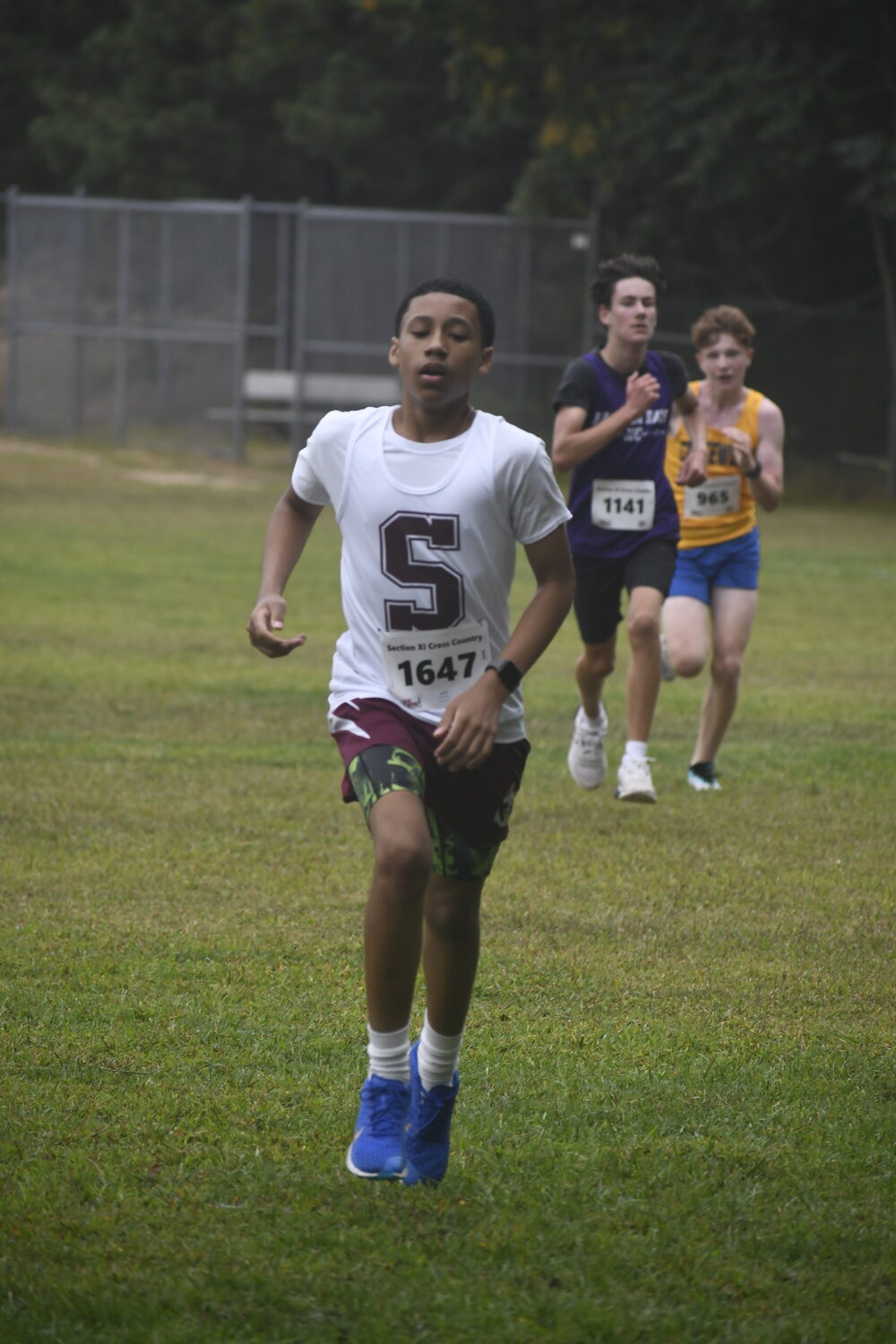 Bryce Bess finished eighth in the boys freshman 1.5-mile race on Saturday.  DREW BUDD