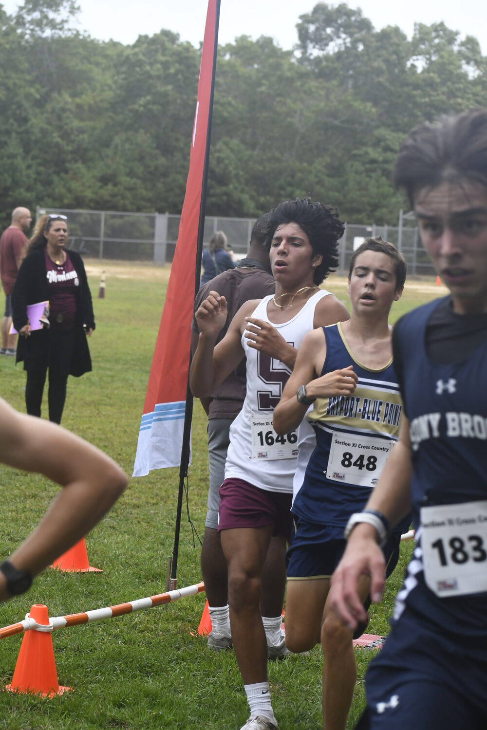 Tristan Angel was the first Mariner to cross the finish line of the boys varsity 