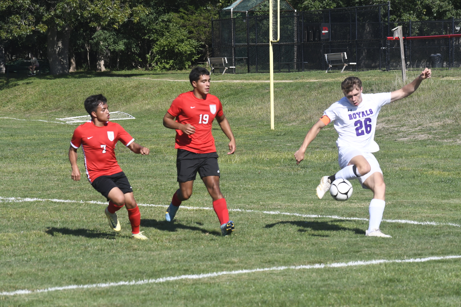 Pierson seniors Erick Bautista (7) and Ricardo Lima pressure a Port Jeff player.  DREW BUDD