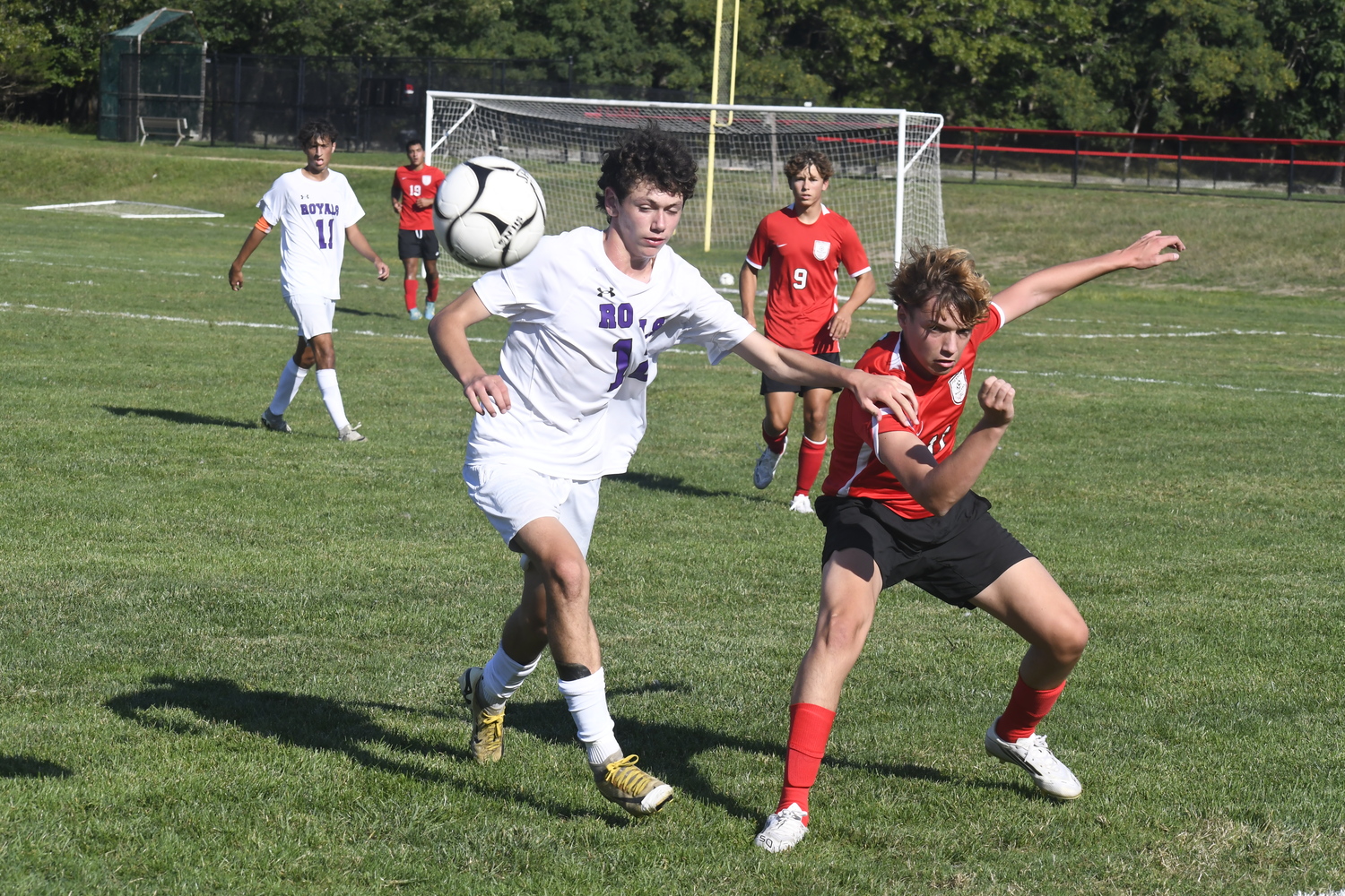 Pierson senior Lucas Borghi tries to push the ball upfield near the sideline.  DREW BUDD