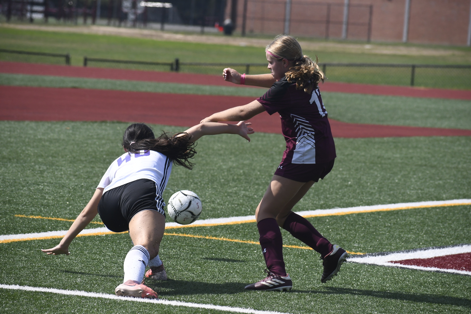 Southampton eighth-grader Peyton Hull forces a turnover.  DREW BUDD