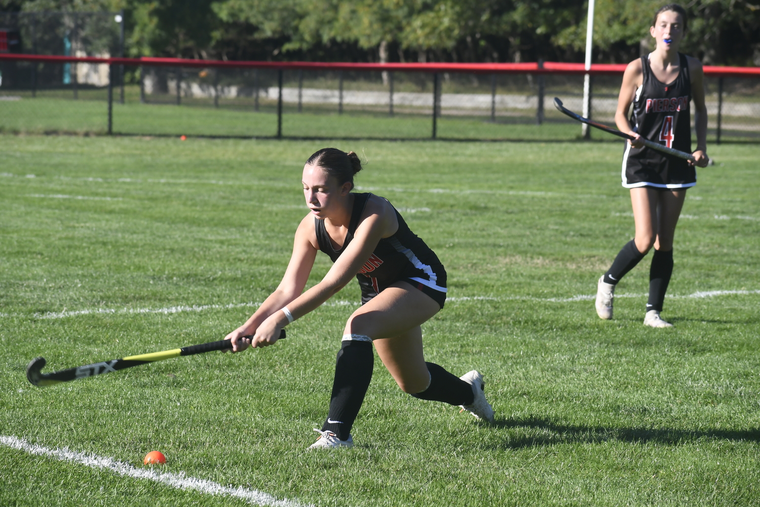 Bridgehampton sophomore Kate Vinski sends the ball upfield. DREW BUDD