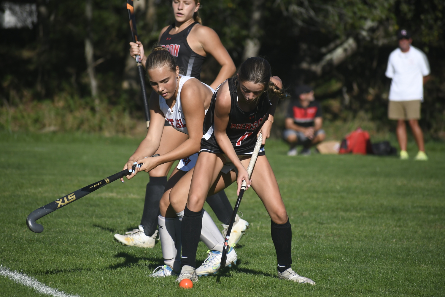Pierson sophomore Zoe Esposito shields the ball from an East Islip player  DREW BUDD