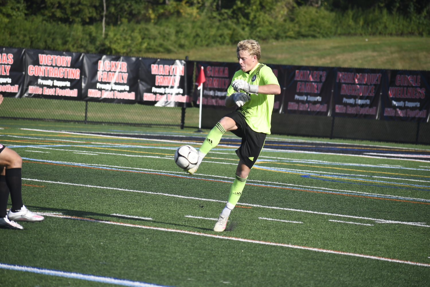Westhampton Beach junior goalie Nate Cangelosi comes out to nearly midfield to avoid an East Islip breakaway.  DREW BUDD