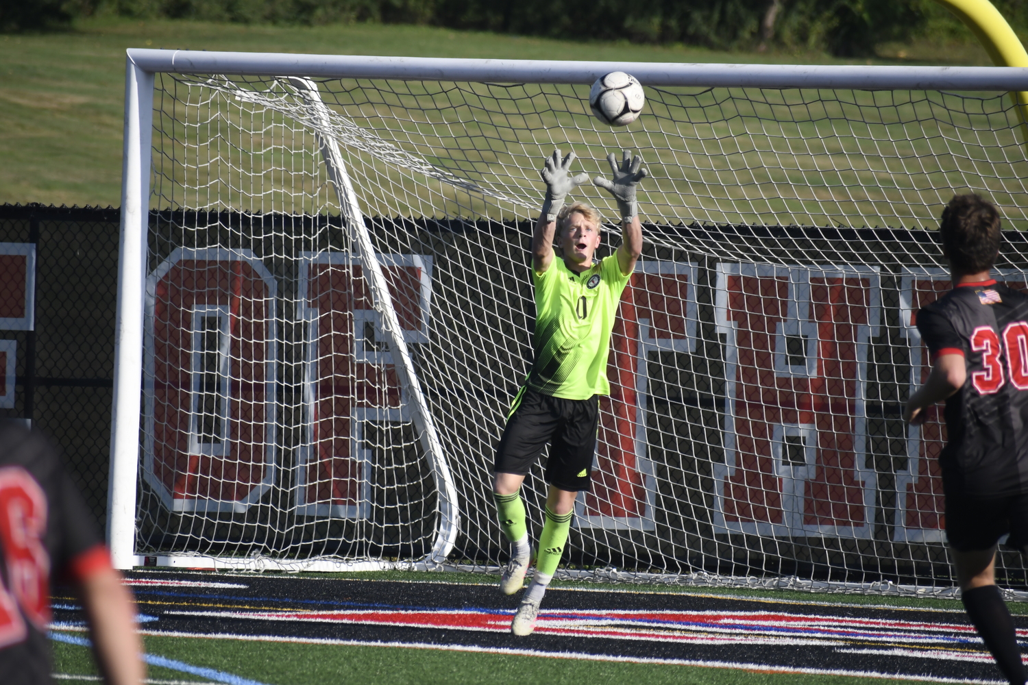 Westhampton Beach junior goalie Nate Cangelosi calls for an incoming ball in the box.  DREW BUDD