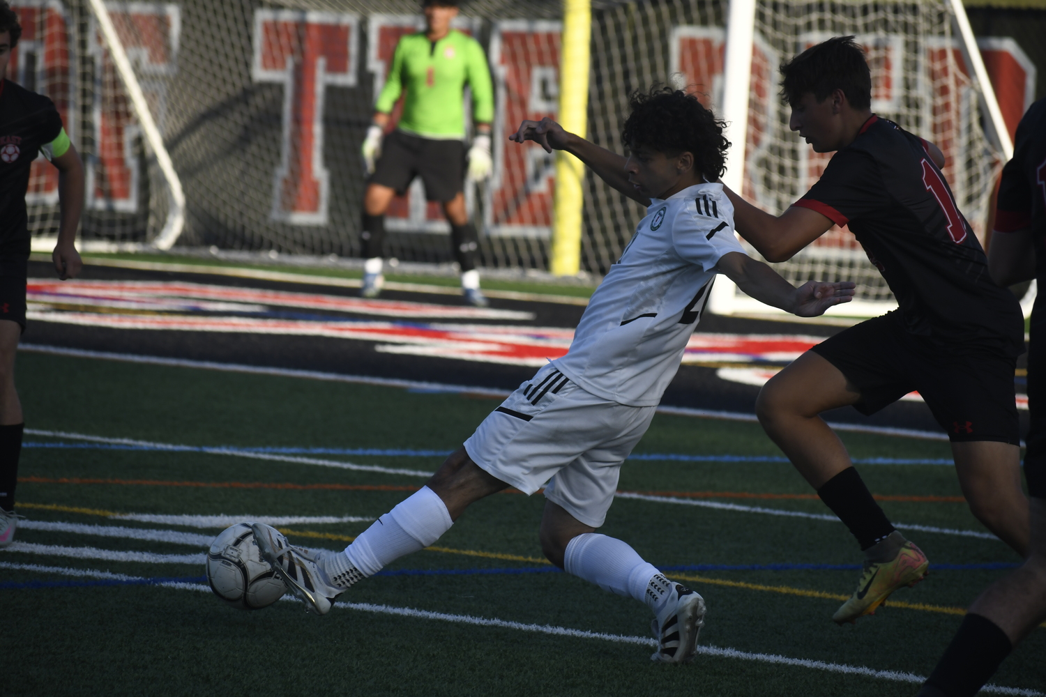 Angelo Melendez? gets a foot on the ball. DREW BUDD