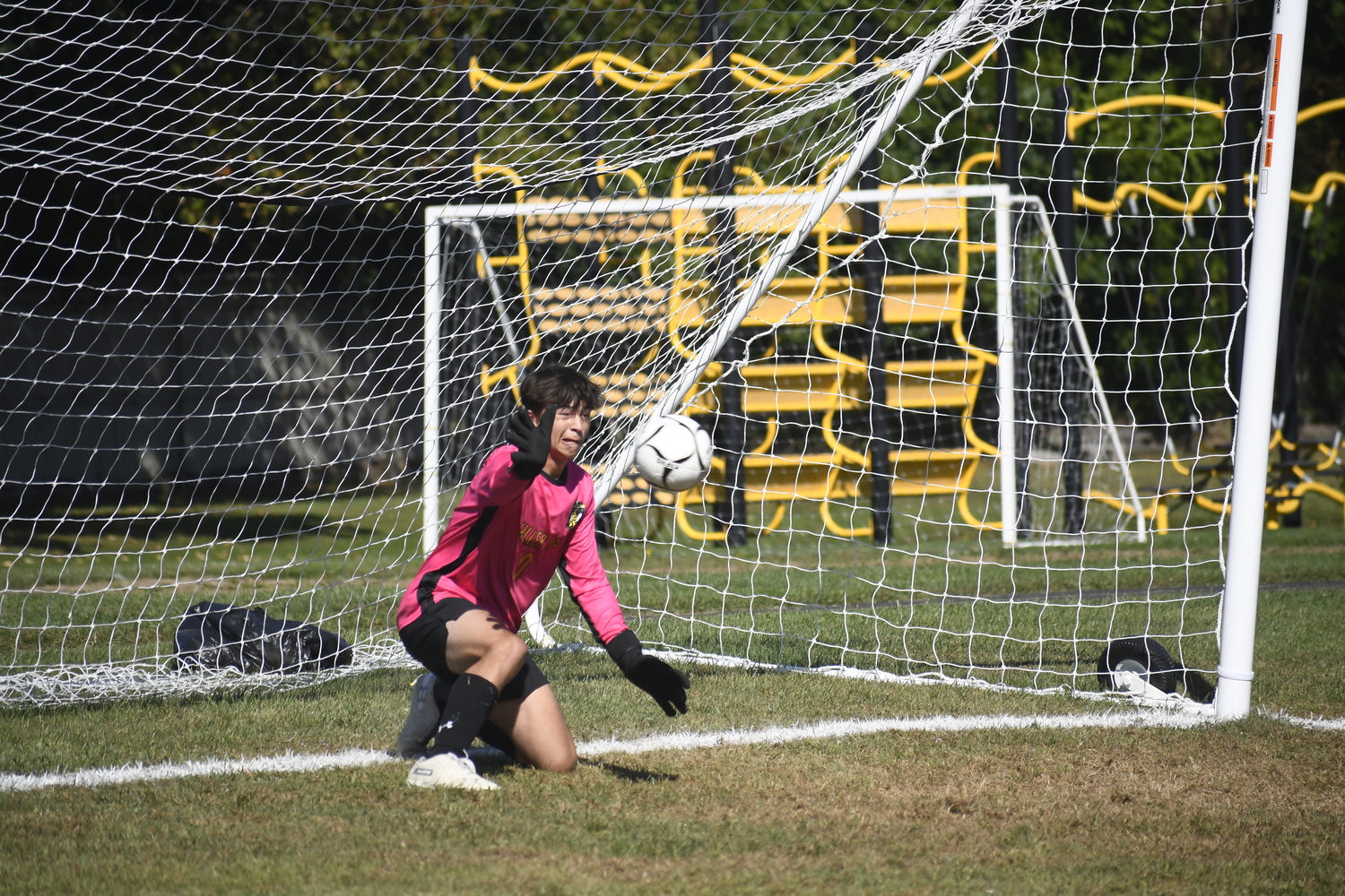 Kai Alversa makes a save on a penalty shot.  DREW BUDD