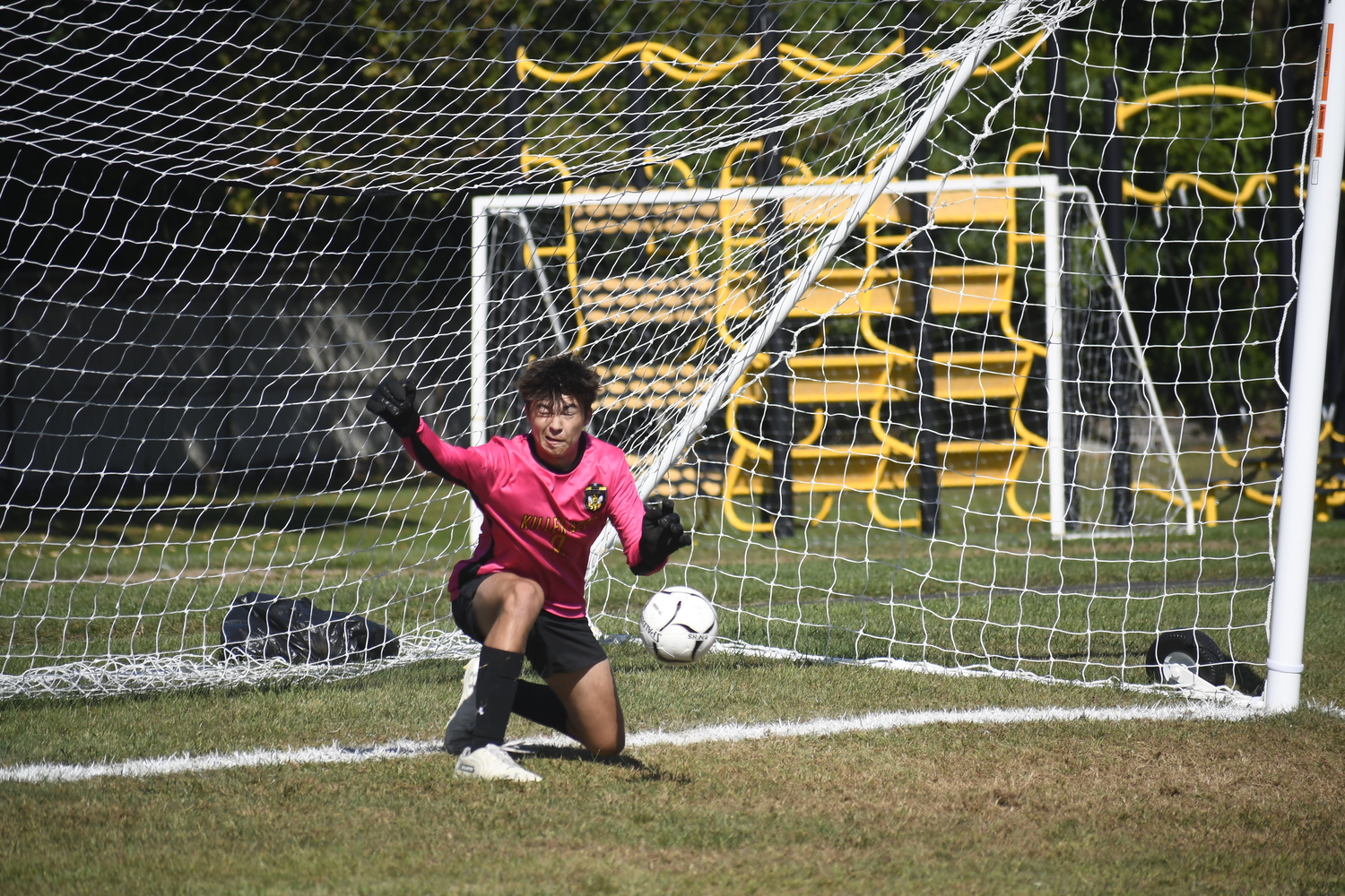 Kai Alversa makes a save on a penalty shot.  DREW BUDD