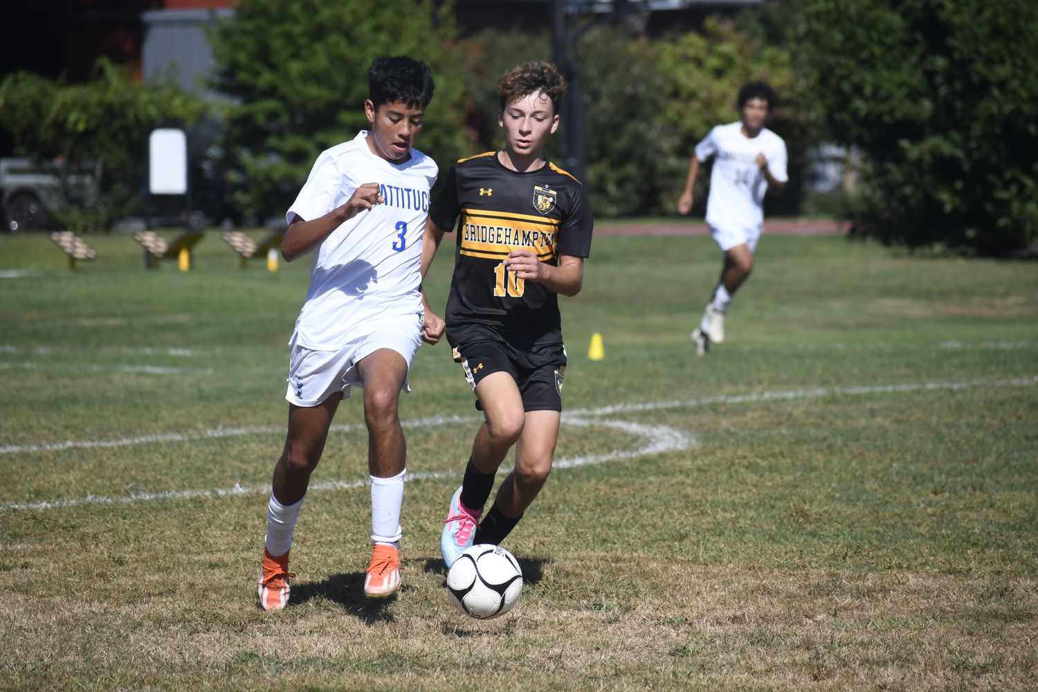 Bridgehampton freshman Nate Feierstein pressures a Mattituck player.  DREW BUDD