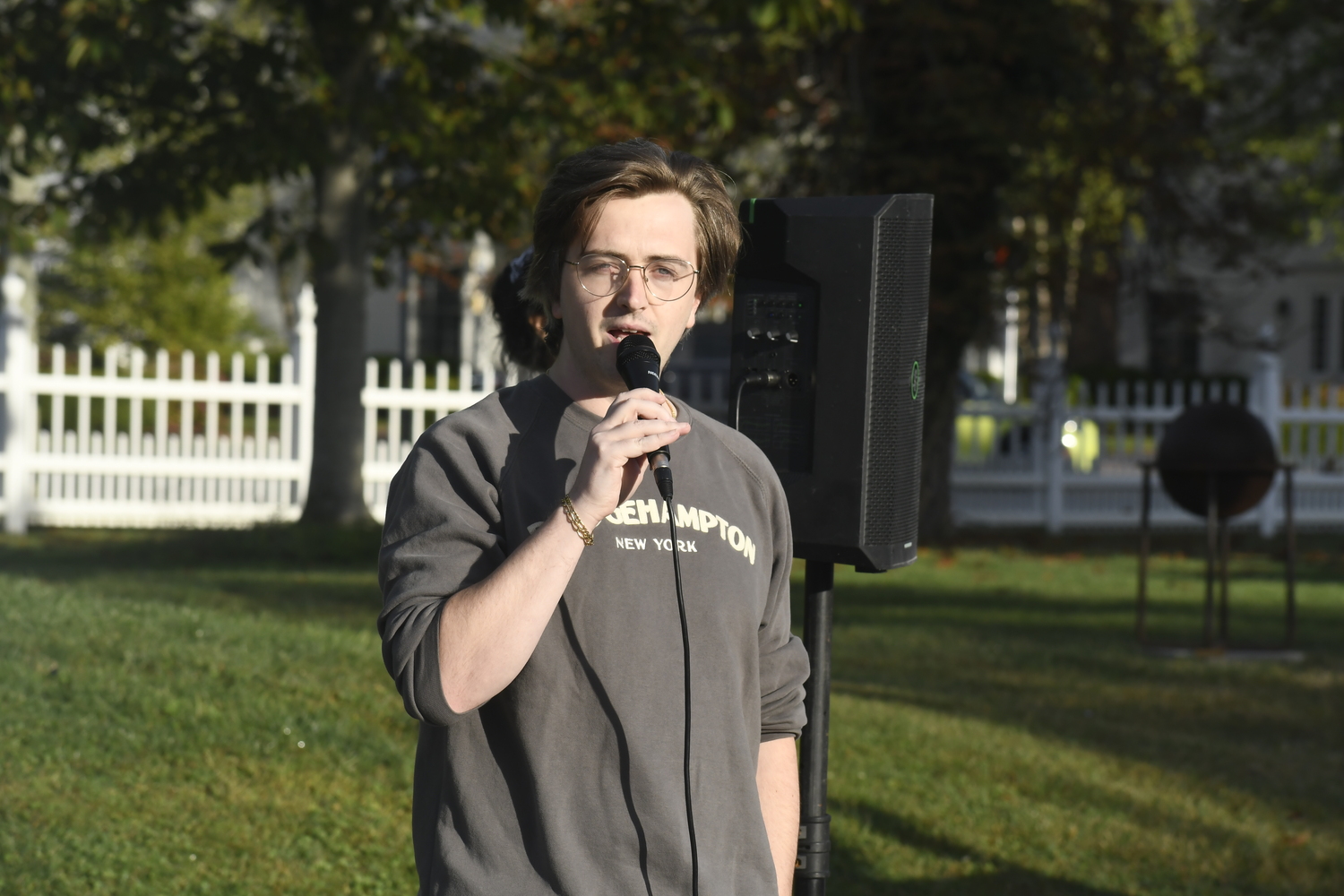 Bridgehampton Museum Executive Director Connor Flanagan goes over a few safety measures before the start of Sunday morning's race.  DREW BUDD