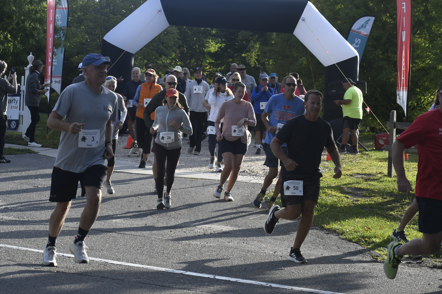 The start of the Pototohampton 5K in Bridgehampton on Sunday morning.  DREW BUDD