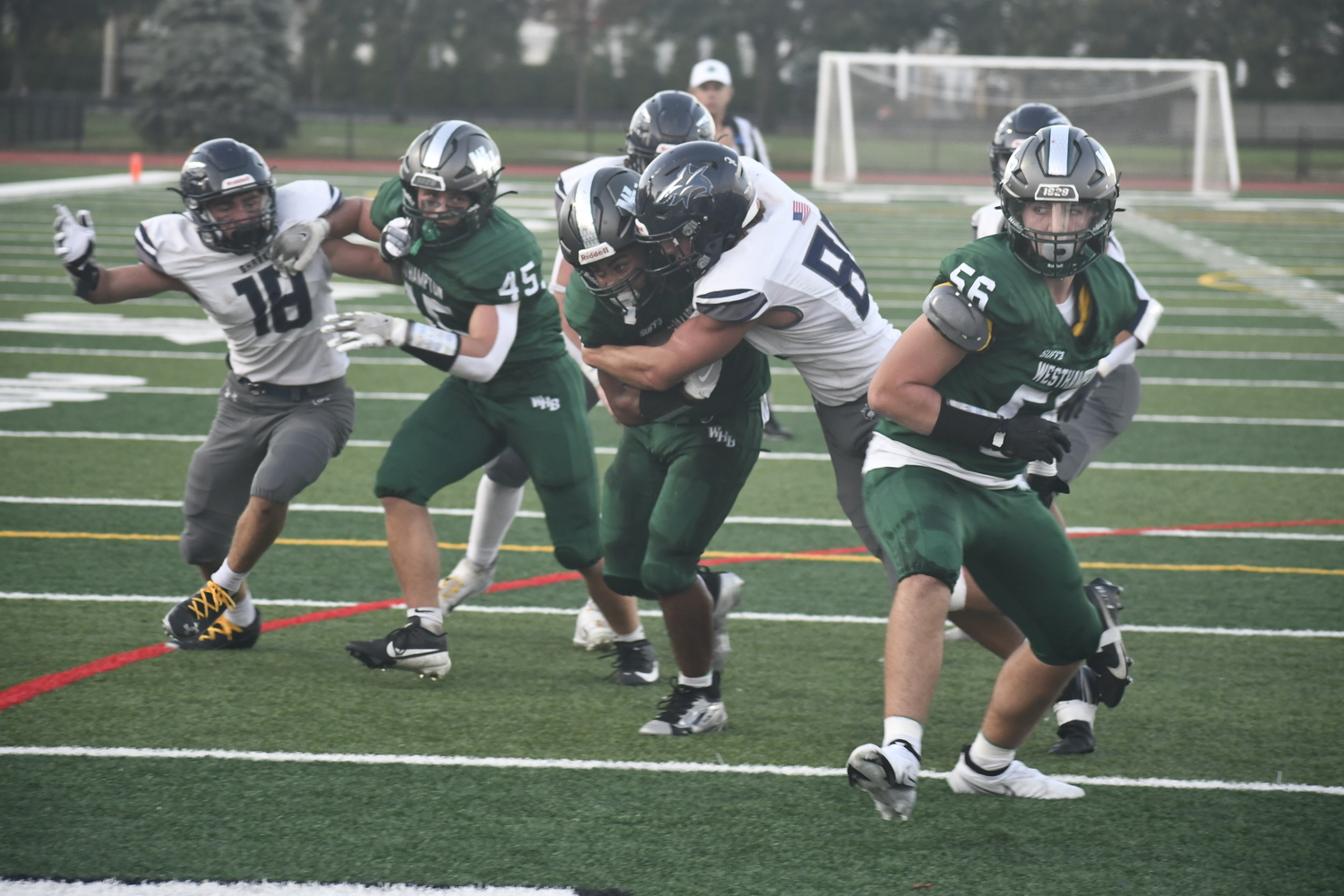 Despite an ESM defender on him, Westhampton Beach junior Nic Simone gets into the end zone for his third touchdown of the night. He finished with five.  DREW BUDD