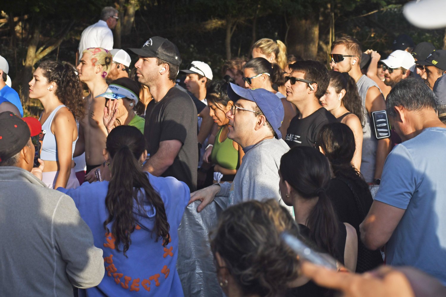 Runners await the start of the Hamptons Marathon and Half Marathon on Saturday morning in Southampton Village.  DREW BUDD